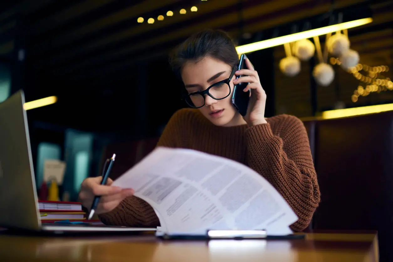 A Photo of a girl talking to her phone